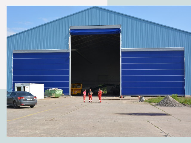 Ангарные ворота в Удомля от СтальСтрой-Дмл по цене 623 руб.